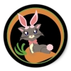 A gray kitty with pink buny ears ans cotton tail.